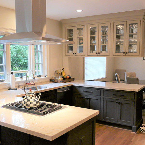 white countertops and black cabinets