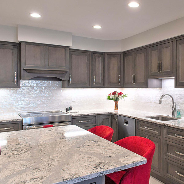 white countertop and red chairs